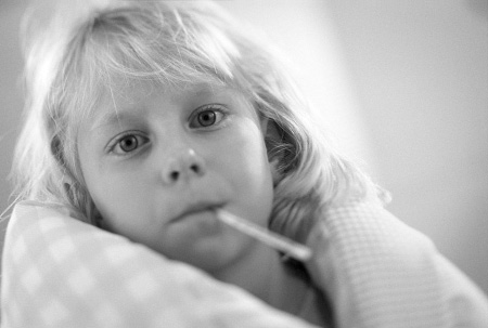 child with thermometer